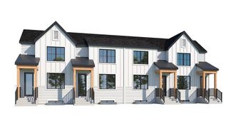 Photo 1: 121 Heirloom Way SE in Calgary: C-390 Row/Townhouse for sale : MLS®# A2042931