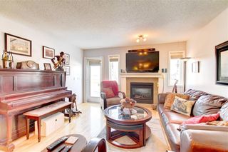 Photo 7: 25 Speargrass Boulevard: Carseland Semi Detached for sale : MLS®# A1244690