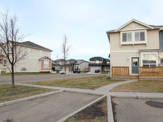 Photo 2: 301 703 LUXSTONE Square: Airdrie Townhouse for sale : MLS®# C3642504