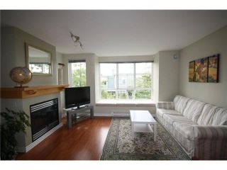 Photo 2: 6711 VILLAGE Grove in Burnaby: Highgate Townhouse for sale in "MONTEREY" (Burnaby South)  : MLS®# V849378