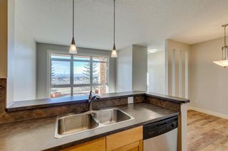 Photo 10: 4 133 Rockyledge View NW in Calgary: Rocky Ridge Row/Townhouse for sale : MLS®# A2094391