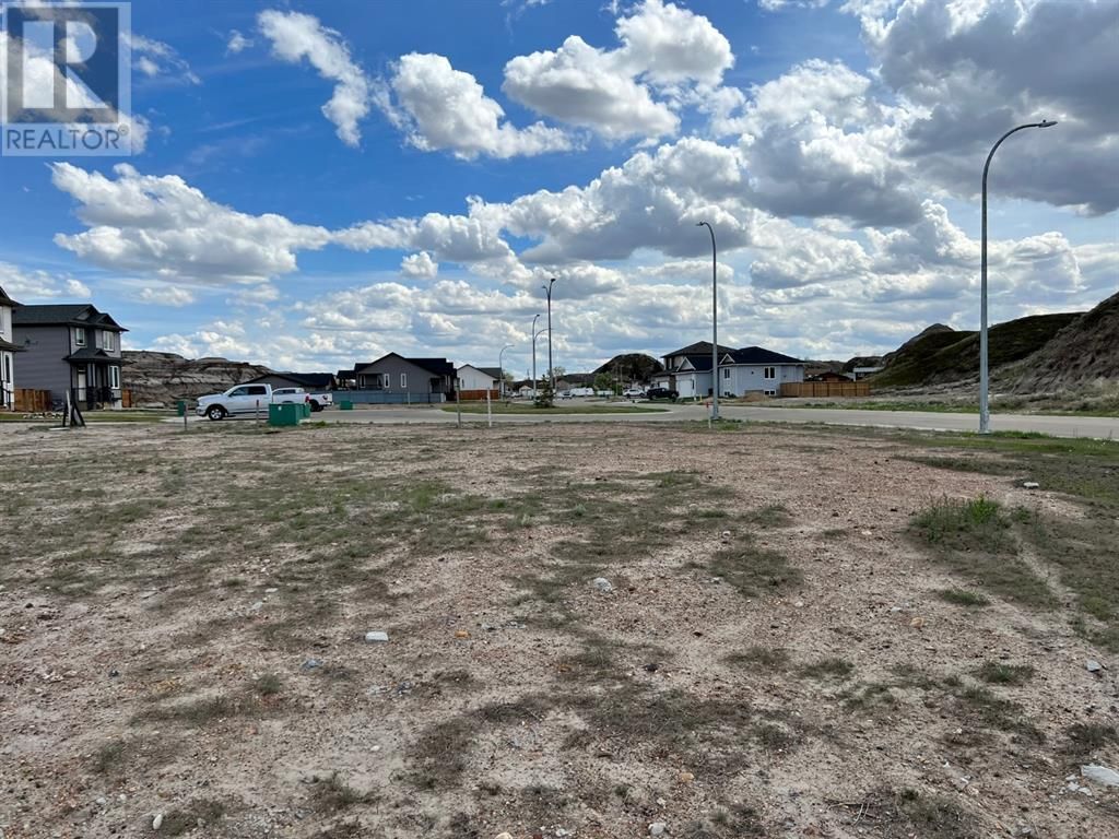 Main Photo: 100 10 Avenue SE in Drumheller: Vacant Land for sale : MLS®# A1216378