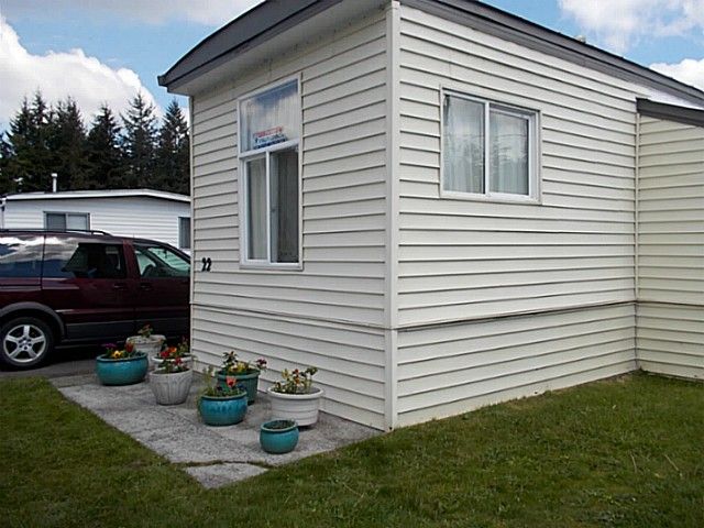 Main Photo: 22 3031 200 Street in Langley: Brookswood Langley Manufactured Home for sale in "Cedar Creek" : MLS®# F1440916