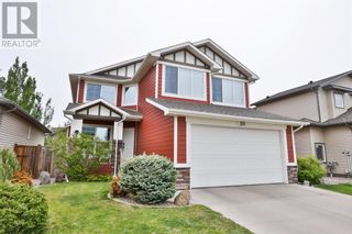 Photo 1: 319 Couleecreek Court S in Lethbridge: House for sale : MLS®# A2032009