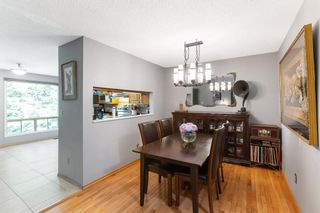 Photo 9: 106 Strathlorne Mews SW in Calgary: Strathcona Park Row/Townhouse for sale : MLS®# A1174641