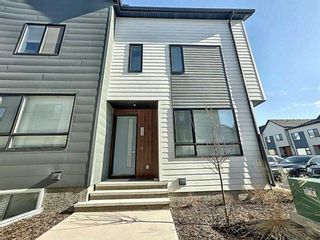 Main Photo: 724 REDSTONE Crescent NE in Calgary: Redstone Row/Townhouse for sale : MLS®# A2068757