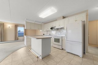 Photo 4: 207 1881 17 Street: Didsbury Apartment for sale : MLS®# A2012712