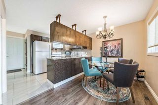 Photo 13: 55 Sandarac Circle NW in Calgary: Sandstone Valley Row/Townhouse for sale : MLS®# A2071485