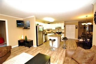 Photo 4: 205 33502 GEORGE FERGUSON Way in Abbotsford: Central Abbotsford Condo for sale in "Carina Court" : MLS®# R2215286