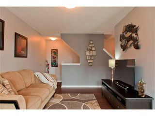 Photo 10: 100 WINDSTONE Mews SW: Airdrie House for sale : MLS®# C4055687