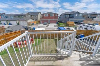 Photo 32: 60 Sunset Road: Cochrane Row/Townhouse for sale : MLS®# A2115454