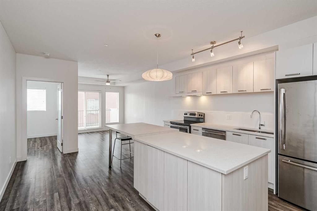 Main Photo: 309 730 5 Street NE in Calgary: Renfrew Apartment for sale : MLS®# A2077350