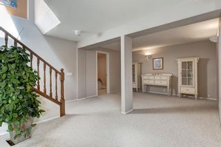 Photo 22: 82 SIENNA PARK Place SW in Calgary: Signal Hill Detached for sale : MLS®# A2043544
