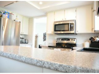 Photo 5: 7325 142A ST in Surrey: East Newton House for sale