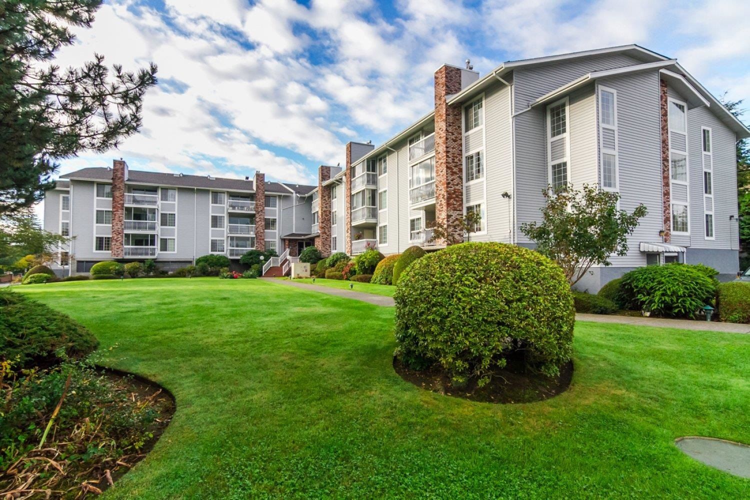Main Photo: 216 5379 205 Street in Langley: Langley City Condo for sale in "Heritage Manor" : MLS®# R2745797