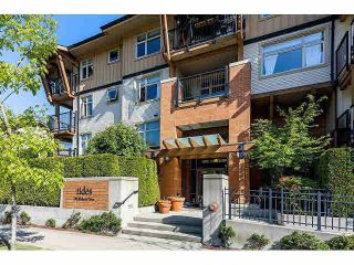 Photo 1: 411 500 KLAHANIE Drive in Port Moody: Port Moody Centre Condo for sale in "TIDES" : MLS®# R2025736
