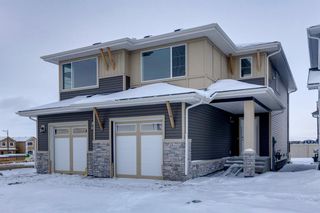 Photo 1: 1405 Bayview Point: Airdrie Semi Detached (Half Duplex) for sale : MLS®# A2007310