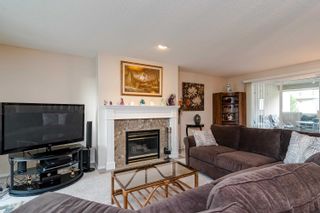 Photo 12: 206 13888 70 Avenue in Surrey: East Newton Townhouse for sale in "Chelsea Gardens" : MLS®# R2680460