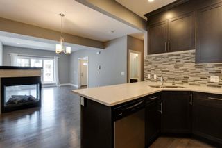 Photo 12: 1 129 12 Avenue NW in Calgary: Crescent Heights Row/Townhouse for sale : MLS®# A1239257
