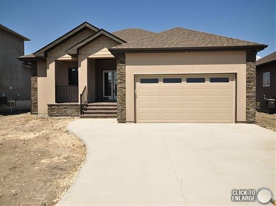 IMPRESSIVE New Custom Built 1687 sf 3 Bedroom Bungalow on piles, AT2 22x24 Garage on 65x118 Lot in Desirable Aspen Lakes Development in Town of Oakbank. 