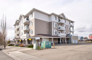 Photo 2: 304 132 1 Avenue NW: Airdrie Apartment for sale : MLS®# A1130474