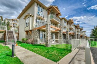 Photo 3: 1 117 Rockyledge View NW in Calgary: Rocky Ridge Row/Townhouse for sale : MLS®# A2137887