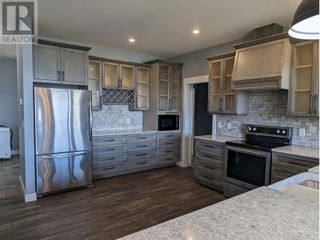 Photo 7: 7464 McLennan Road North BX: Okanagan Shuswap Real Estate Listing: MLS®# 10311086