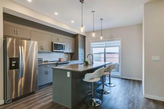 Photo 6: 142 Shawnee Common SW in Calgary: Shawnee Slopes Row/Townhouse for sale : MLS®# A2103685