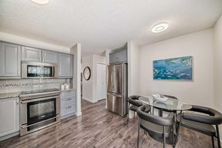 Photo 11: 59 Sandarac Circle NW in Calgary: Sandstone Valley Row/Townhouse for sale : MLS®# A2116581
