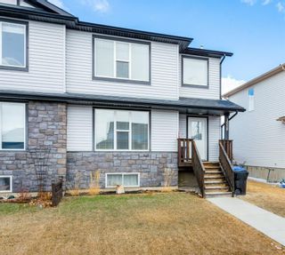 Photo 1: 1558 McAlpine Street: Carstairs Semi Detached for sale : MLS®# A1200586