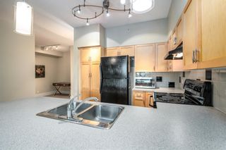 Photo 9: 406 205 Riverfront Avenue SW in Calgary: Chinatown Apartment for sale : MLS®# A1236318