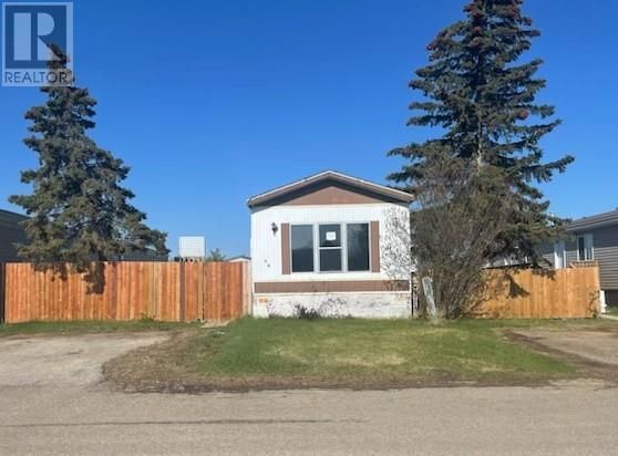 Main Photo: 64, 812 6 Avenue SW in Slave Lake: House for sale : MLS®# A2048158