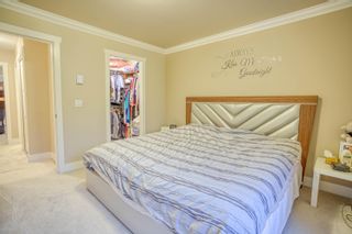 Photo 14: 115 15399 GUILDFORD Drive in Surrey: Guildford Townhouse for sale in "GUILDFORD GREEN" (North Surrey)  : MLS®# R2747675