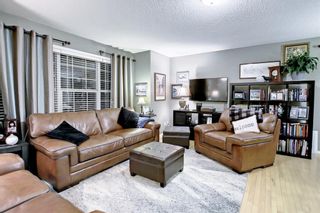 Photo 2: 123 Tuscany Springs Gardens NW in Calgary: Tuscany Row/Townhouse for sale : MLS®# A1189424