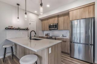 Photo 4: 1210 220 Seton Grove SE in Calgary: Seton Apartment for sale : MLS®# A2108318