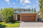 Main Photo: 112 Straddock Crescent SW in Calgary: Strathcona Park Detached for sale : MLS®# A2131558