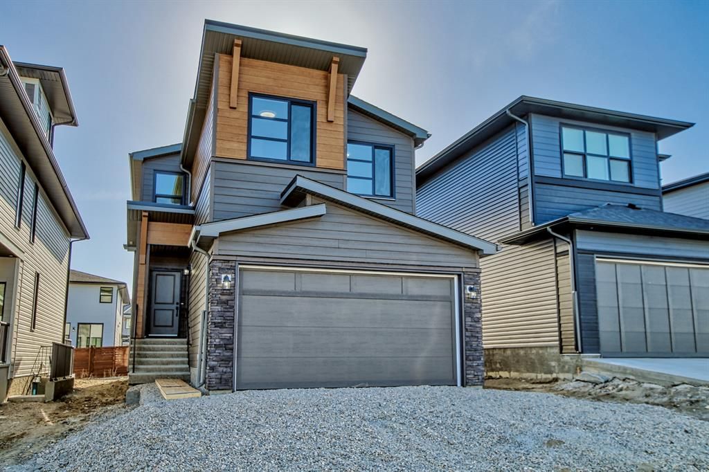 Main Photo: 38 Rowley Park NW in Calgary: C-483 Detached for sale : MLS®# A2046176