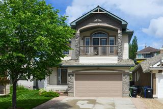 Photo 1: 7866 Springbank Way SW in Calgary: Springbank Hill Detached for sale : MLS®# A1232036
