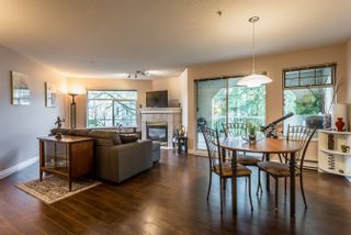 Photo 2: 215 20894 57 Avenue in Langley: Langley City Condo for sale in "BAYBERRY LANE" : MLS®# R2254851