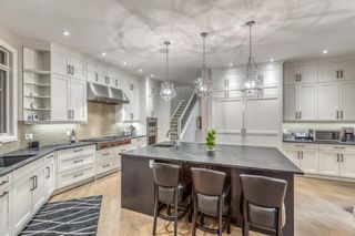 Photo 14: 11 Elveden Place SW in Calgary: Springbank Hill Detached for sale : MLS®# A2013724