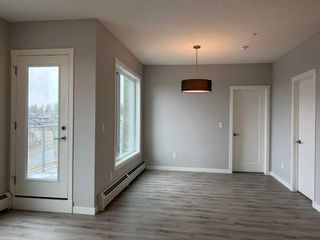 Photo 4: 412 200 Shawnee Square SW in Calgary: Shawnee Slopes Apartment for sale : MLS®# A2119079
