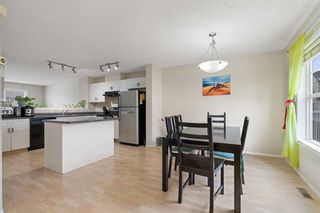 Photo 4: 105 Elgin Gardens SE in Calgary: McKenzie Towne Row/Townhouse for sale : MLS®# A2060511