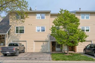 Main Photo: 322 Point Mckay Gardens NW in Calgary: Point McKay Row/Townhouse for sale : MLS®# A2136152