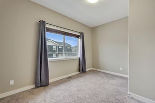 Photo 24: 1519 Symons Valley Parkway NW in Calgary: Evanston Row/Townhouse for sale : MLS®# A1215097