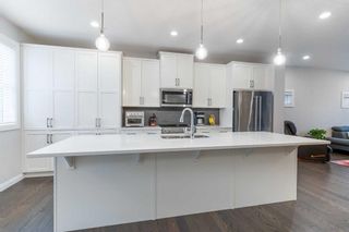 Photo 8: 26 Evanscrest Rise NW in Calgary: Evanston Detached for sale : MLS®# A2096755