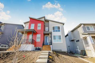 Main Photo: 21 Herron Mews NE in Calgary: Livingston Semi Detached (Half Duplex) for sale : MLS®# A2115481