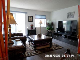 Photo 3: 310 309 Woodside Drive NW: Airdrie Apartment for sale : MLS®# A2050615