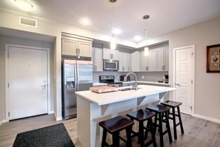Photo 5: 102 6703 New Brighton Avenue SE in Calgary: New Brighton Apartment for sale : MLS®# A1215599