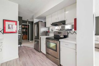 Photo 5: 411 2204 1 Street SW in Calgary: Mission Apartment for sale : MLS®# A2117586