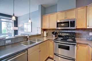 Photo 16: 1 108 Rockyledge View NW in Calgary: Rocky Ridge Row/Townhouse for sale : MLS®# A1234759